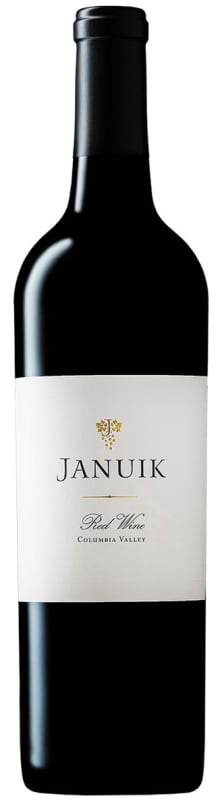 Januik Merlot wine bottle with a white label on a black background