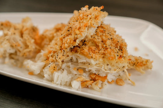Crispy fried dish on a white plate with a blurred background