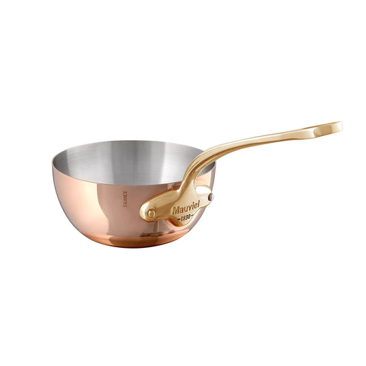 A 3.7-qt curved sauté pan with a polished copper exterior and stainless steel interior, featuring brass handles.