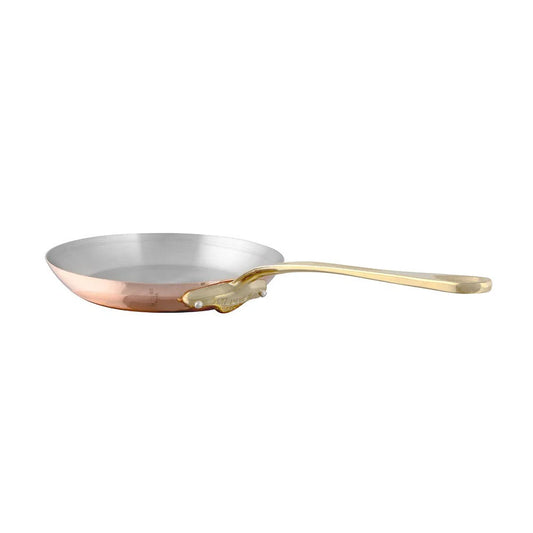 A 7.9-inch copper frying pan with a polished copper exterior and a stainless steel interior.