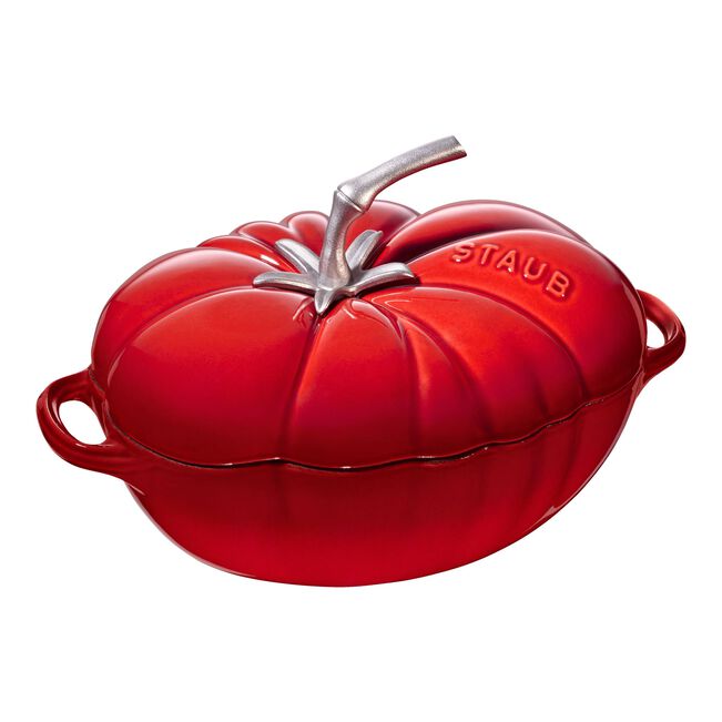 Red Staub tomato-shaped cocotte on a white background